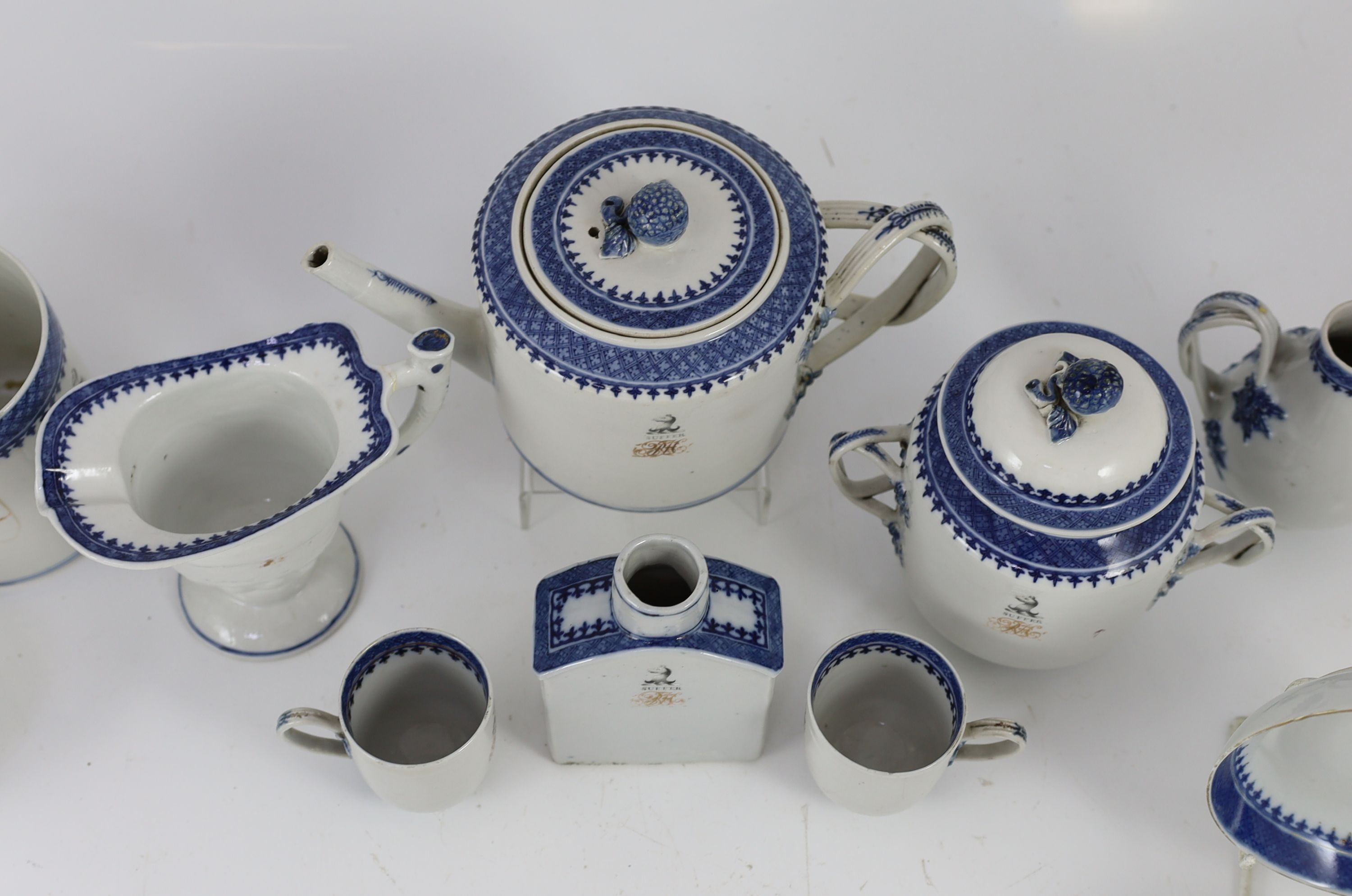 A Chinese export armorial forty two piece part tea service, late 18th century, decorated with the Haldane crest and motto 'Suffer'